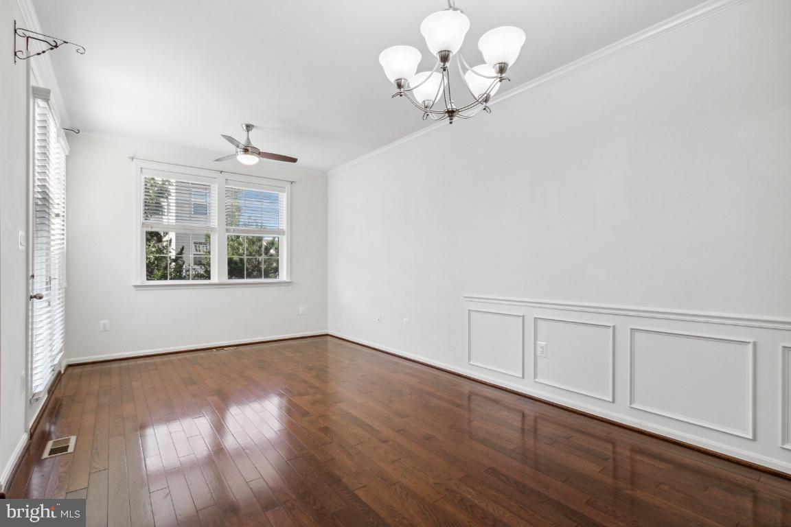 42219 Dean Chapel Square Chantilly, VA 20152 - Photo 8 of 21 wooden floor in an empty room with a window