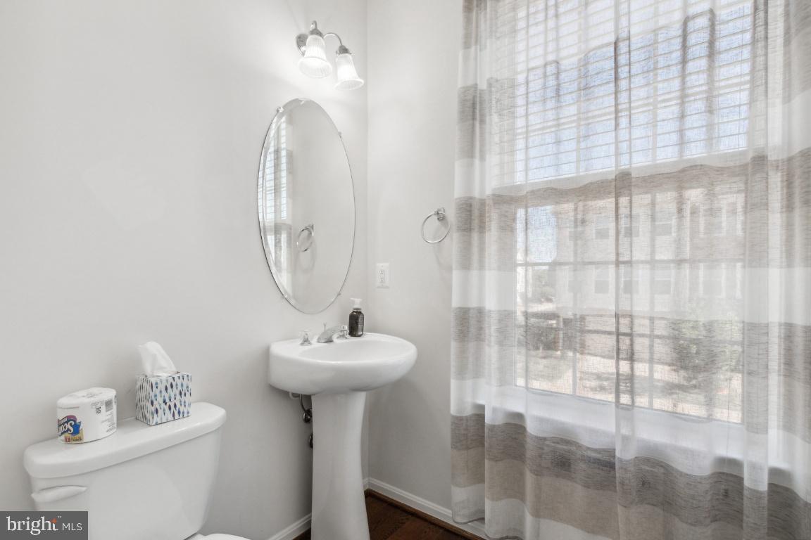 42219 Dean Chapel Square Chantilly, VA 20152 - Photo 9 of 21 a bathroom with a sink toilet and shower