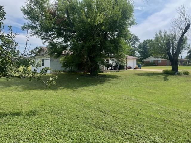 130 Castleman Circle Hewitt, TX 76643 - Photo 3 of 13 a view of yard with swimming pool and green space