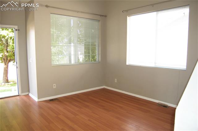 7560 Coffee Road Peyton, CO 80831 - Photo 2 of 17 Vaulted Living room