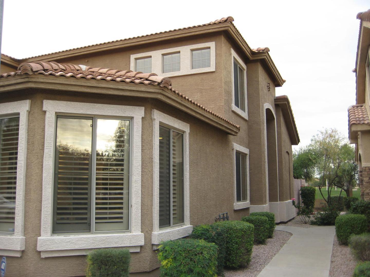 5415 East McKellips Road Mesa, AZ 85215 - Photo 1 of 14 a front view of a house with plants