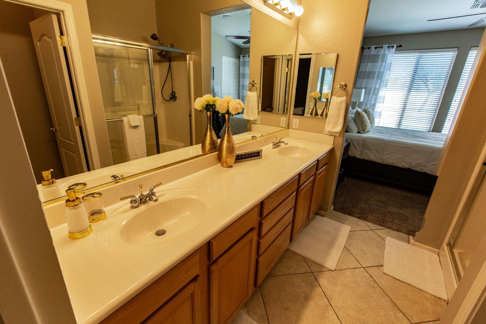 5415 East McKellips Road Mesa, AZ 85215 - Photo 8 of 14 a bathroom with a sink mirror and a shower