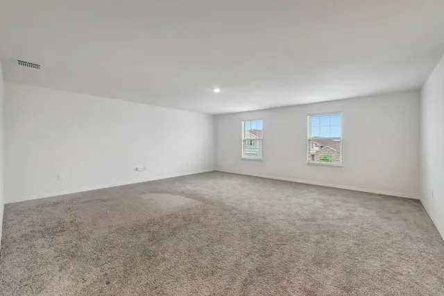 a view of a hallway with a livingroom
