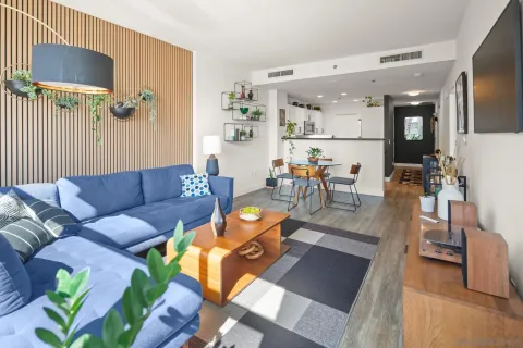 a living room with furniture and a table