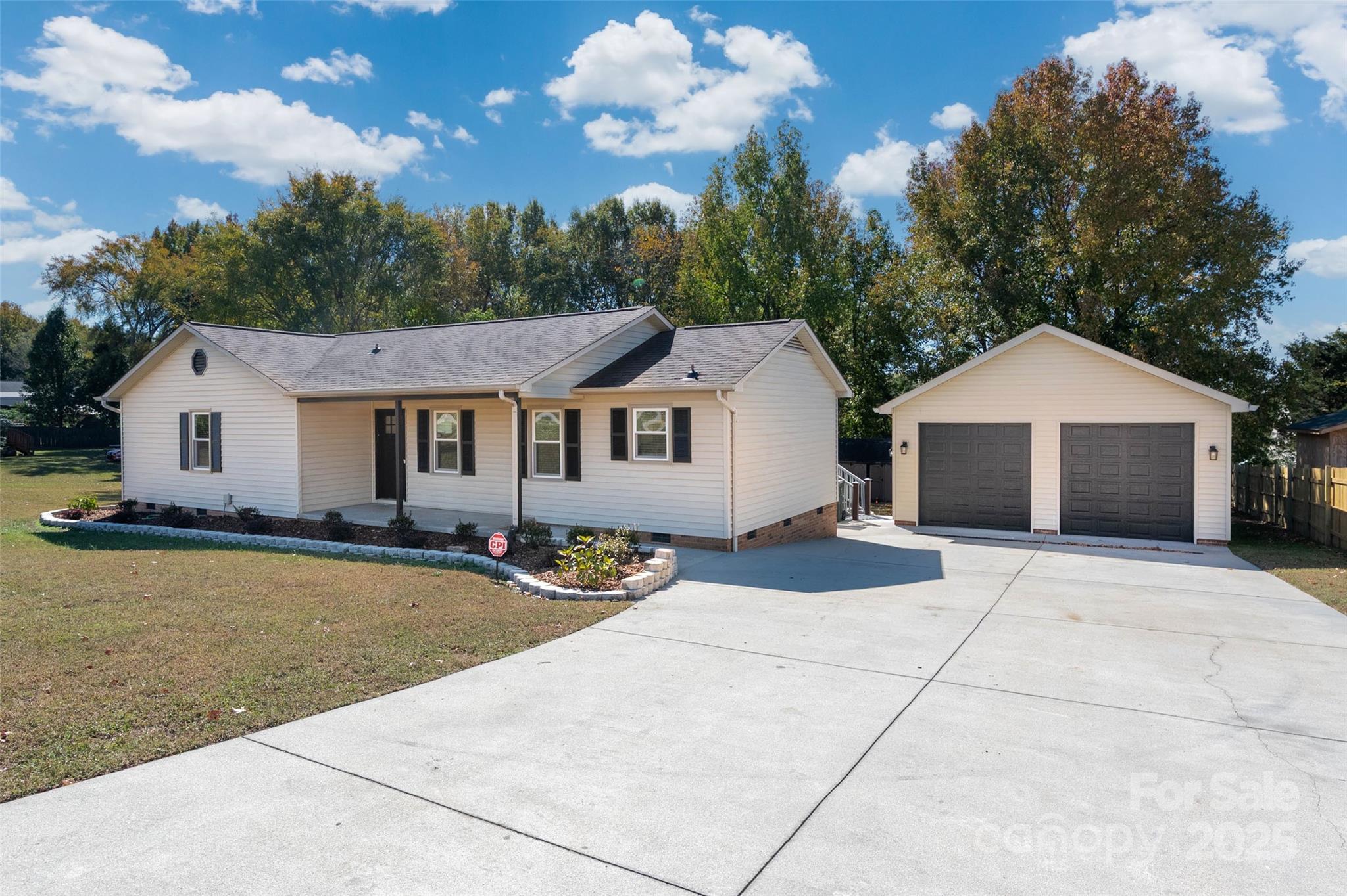 3331 Rock Hill Church Road Concord, NC 28027 - Photo 2 of 46 a front view of a house with yard