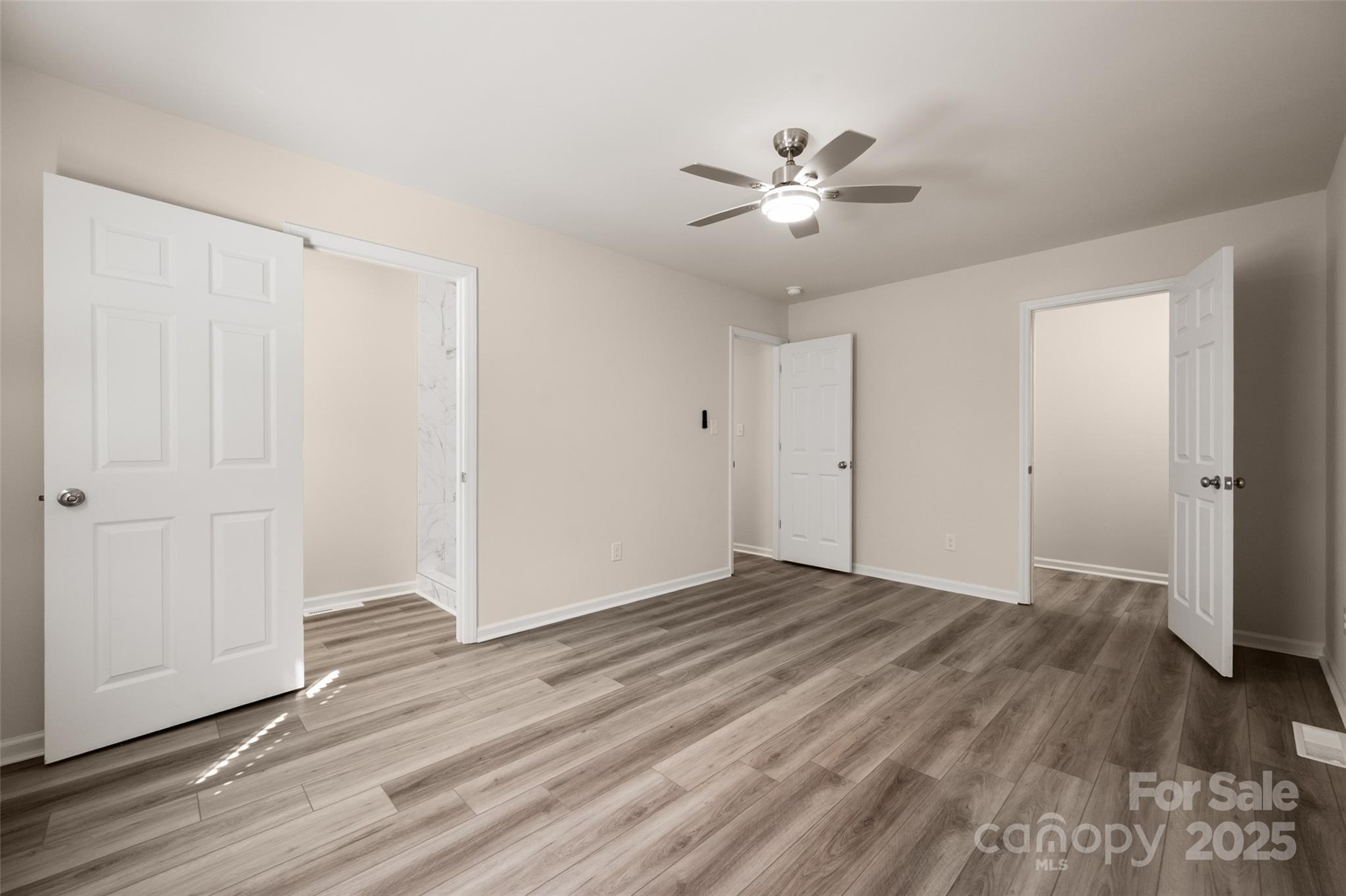 3331 Rock Hill Church Road Concord, NC 28027 - Photo 25 of 46 a view of an empty room with wooden floor