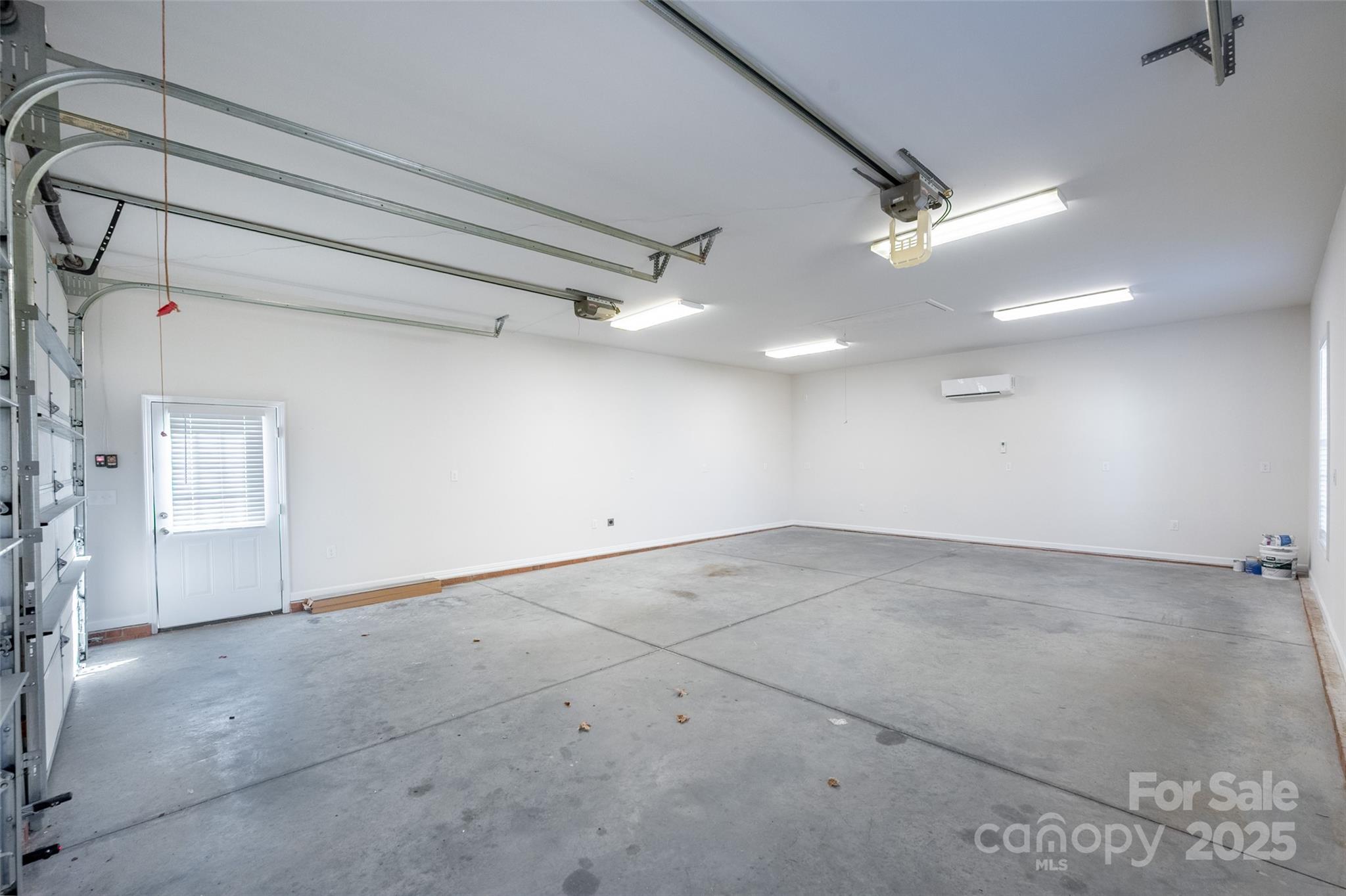3331 Rock Hill Church Road Concord, NC 28027 - Photo 33 of 46 a view of a big room with a ceiling fan
