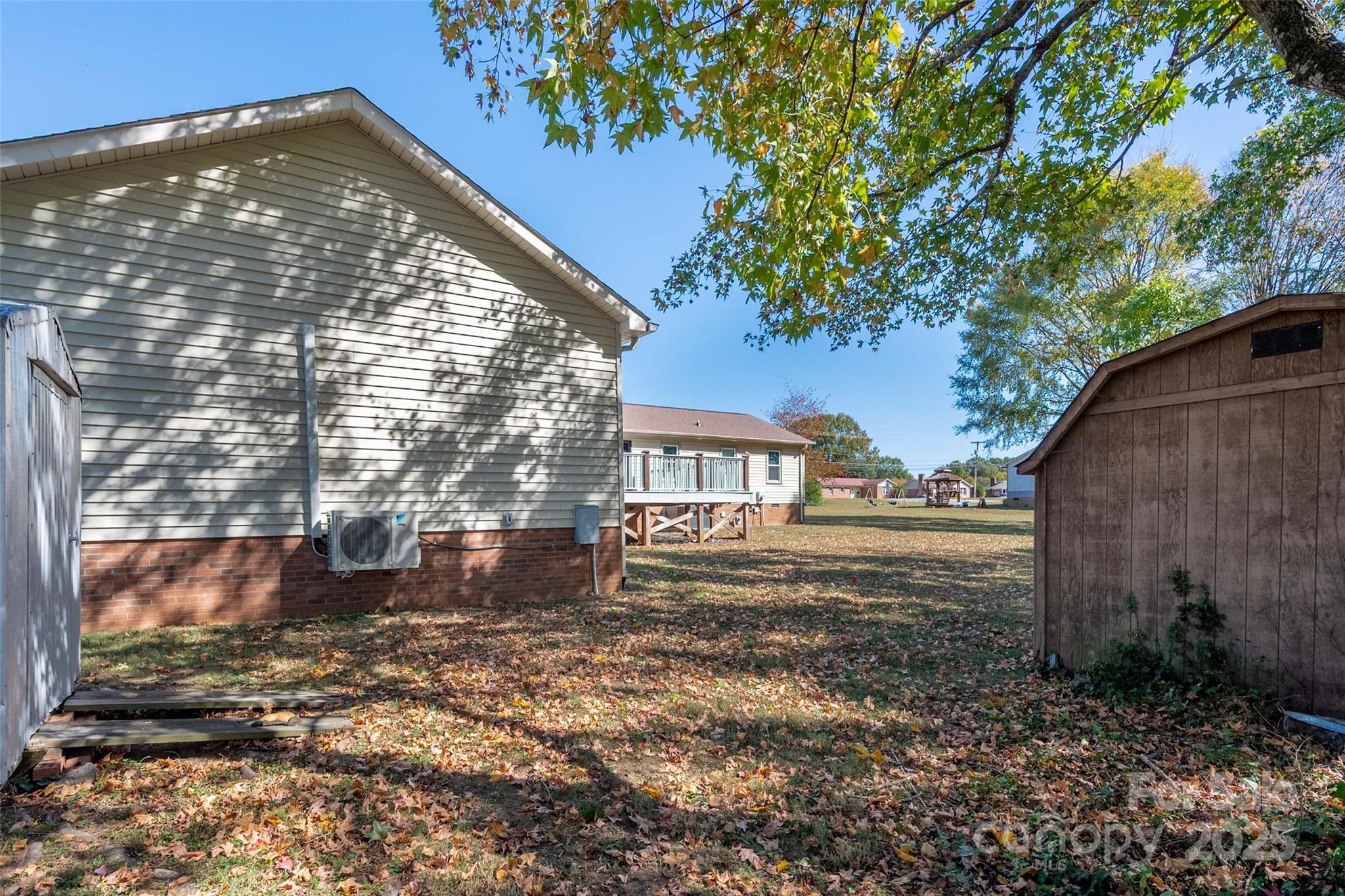 3331 Rock Hill Church Road Concord, NC 28027 - Photo 37 of 46 a view of a house with a yard