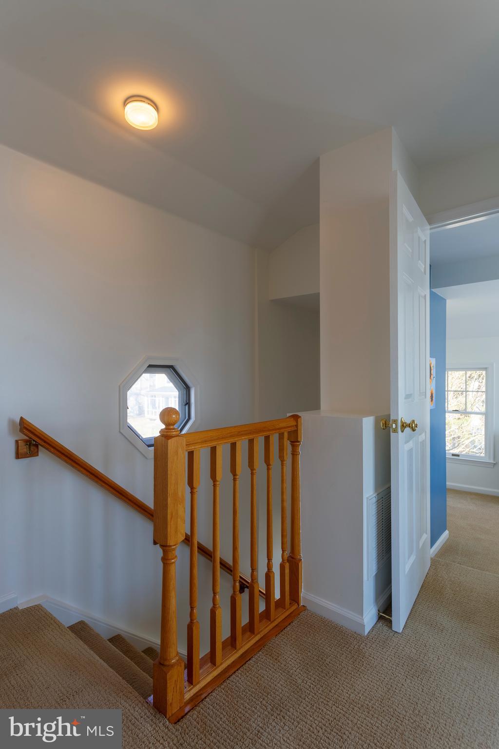 5560 Quaker Neck Landing Road Chestertown, MD 21620 - Photo 17 of 21 Bright second floor landing with built in cabinets