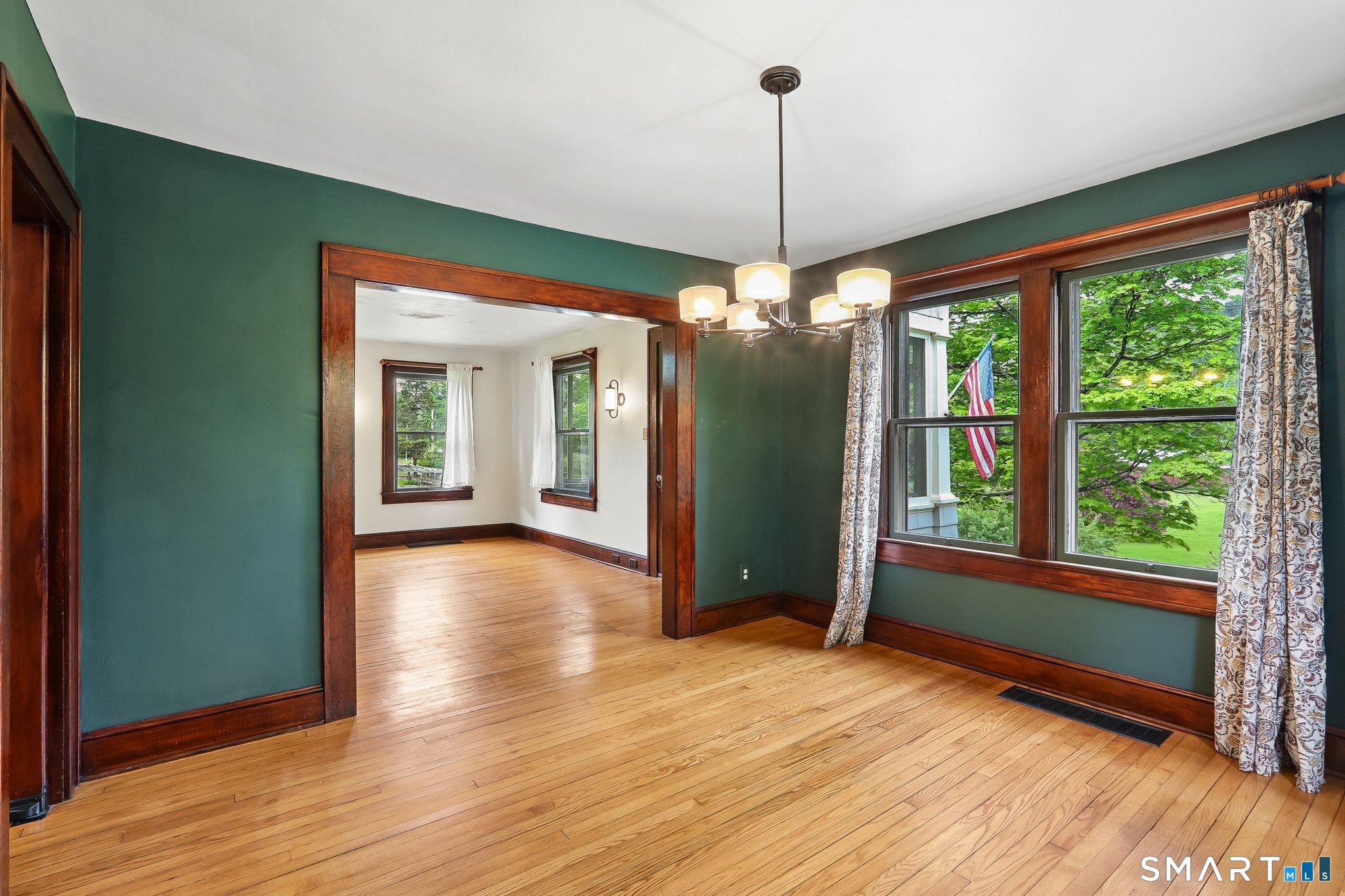 349 Litchfield Road New Milford, CT 06776 - Photo 11 of 27 a view of empty room with wooden floor and fan