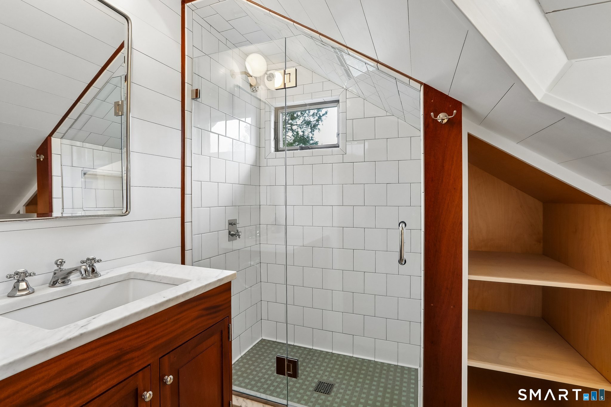 349 Litchfield Road New Milford, CT 06776 - Photo 22 of 27 a bathroom with a sink a toilet and shower