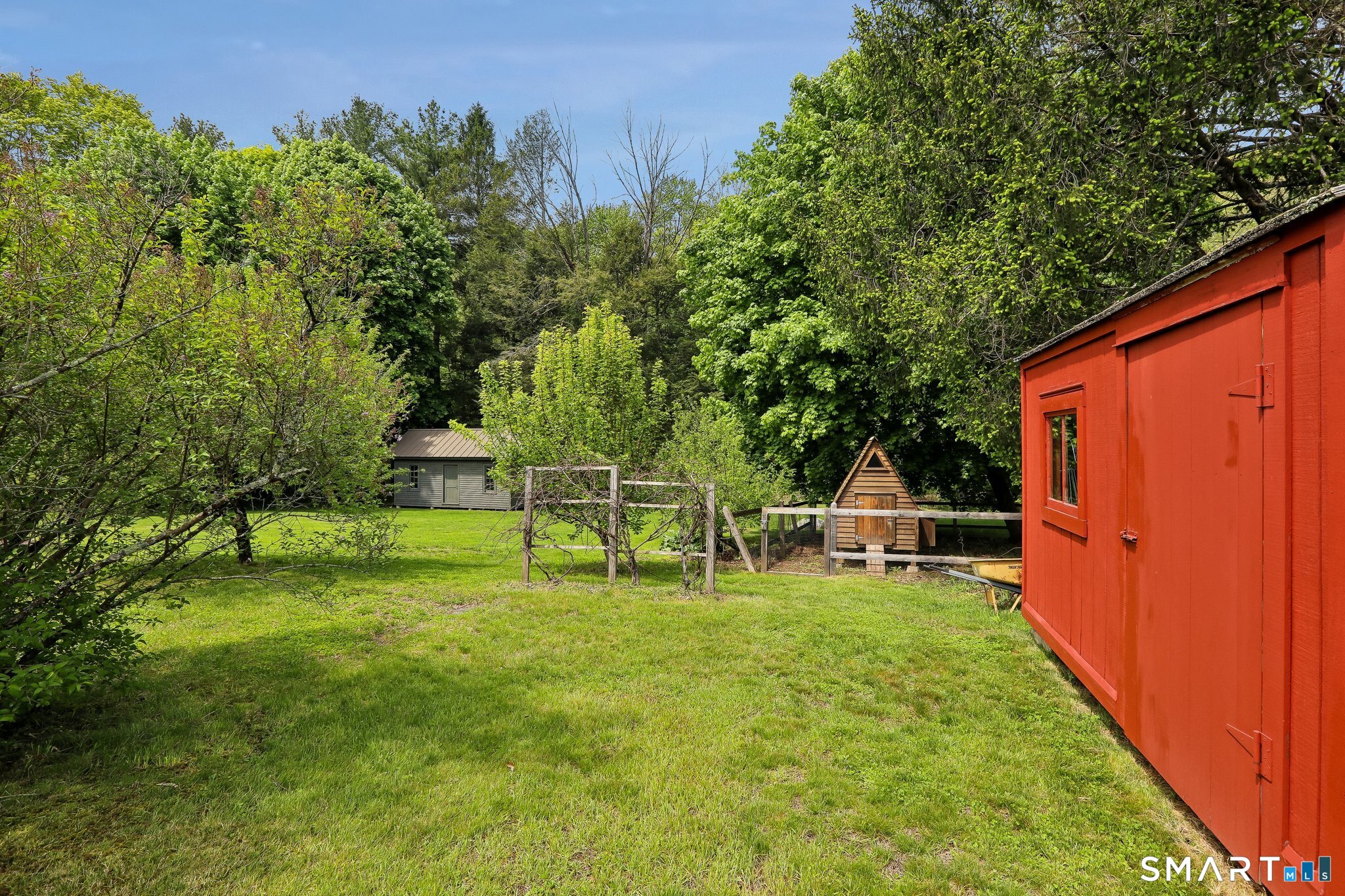 349 Litchfield Road New Milford, CT 06776 - Photo 23 of 27 a view of a backyard with sitting area