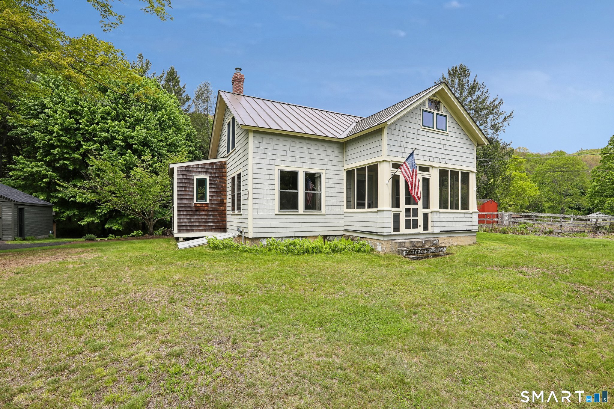 349 Litchfield Road New Milford, CT 06776 - Photo 3 of 27 a view of a house with a backyard