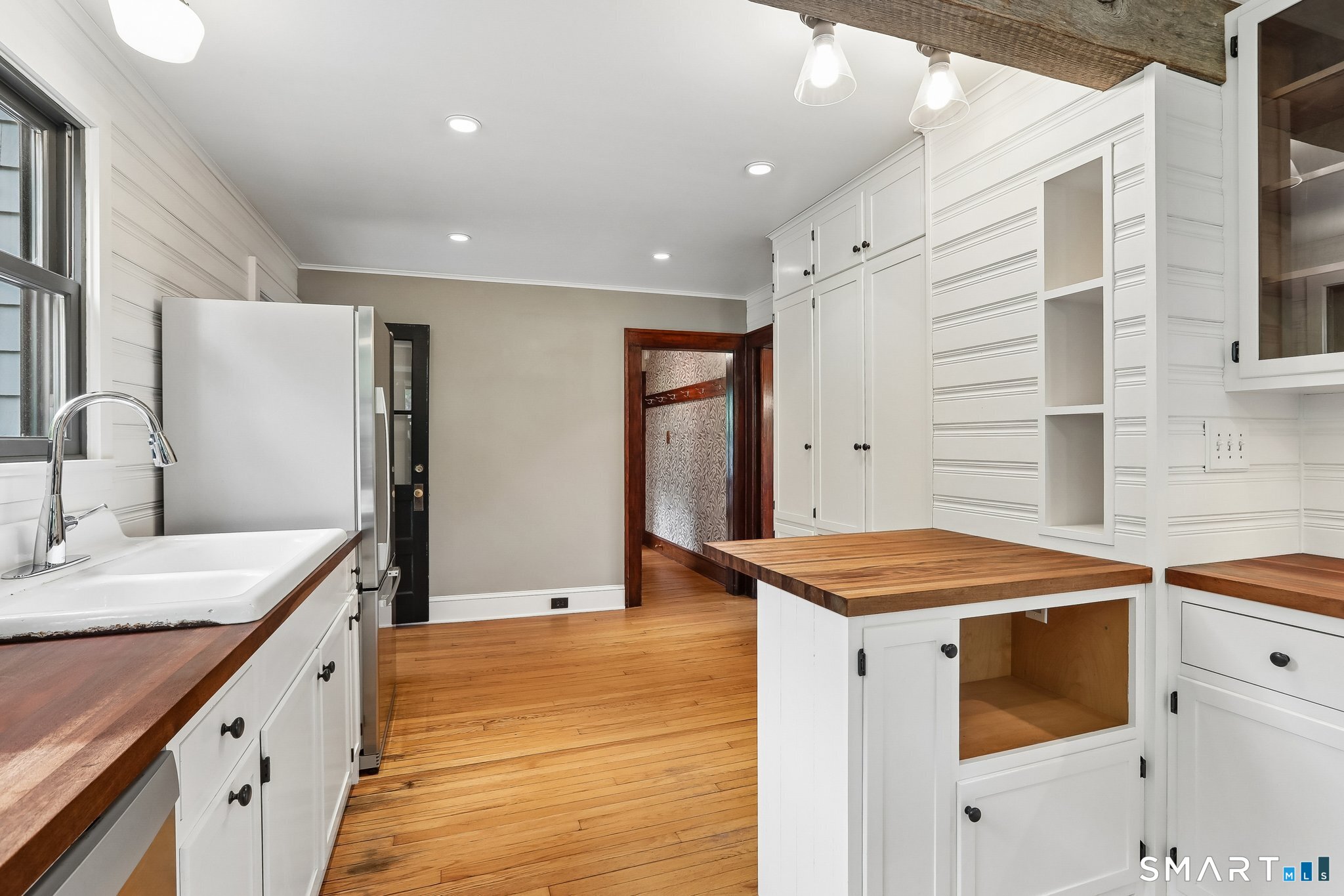 349 Litchfield Road New Milford, CT 06776 - Photo 8 of 27 a kitchen that has a sink a stove and a refrigerator