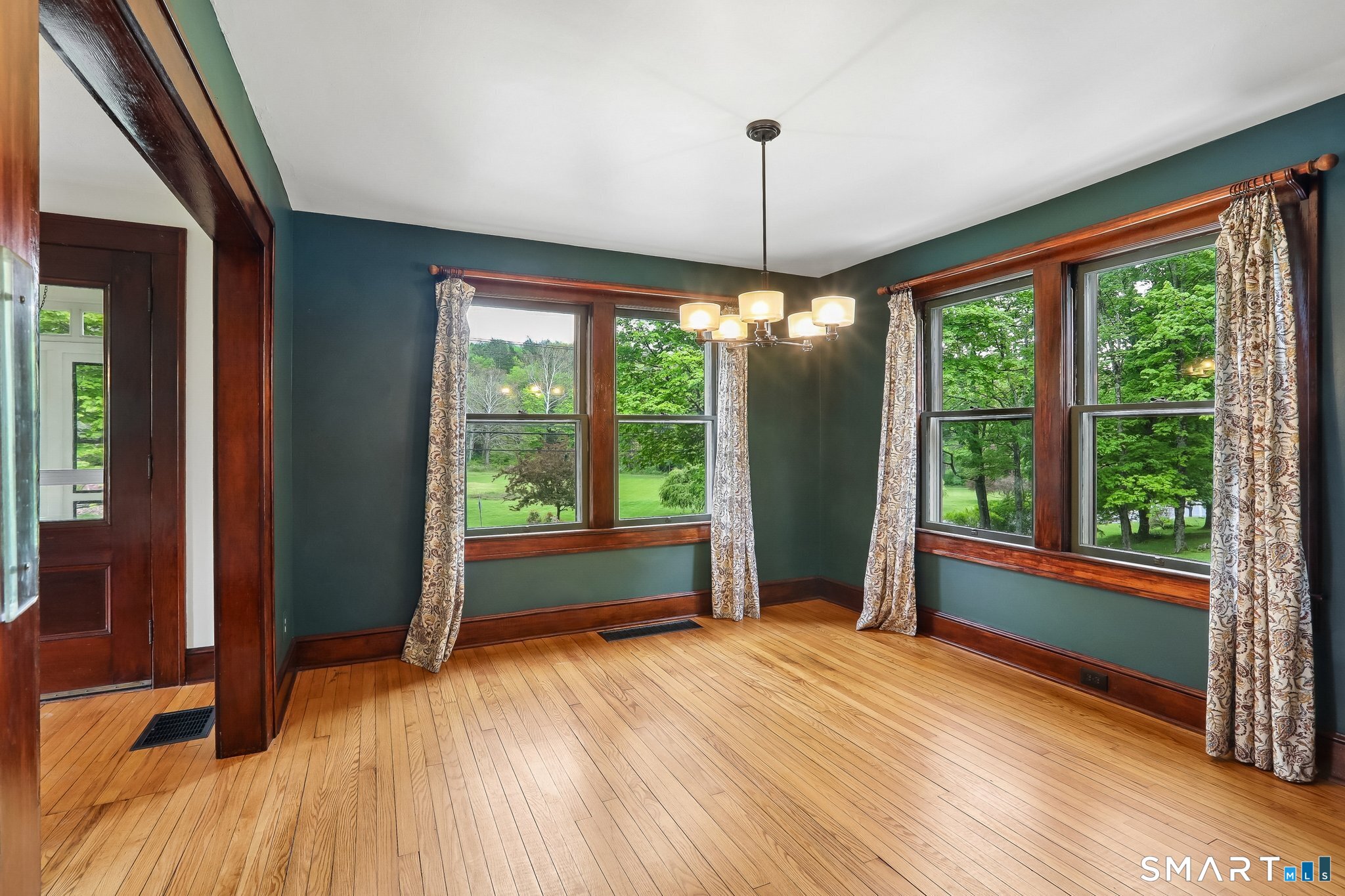 349 Litchfield Road New Milford, CT 06776 - Photo 10 of 27 a view of empty room with wooden floor and fan