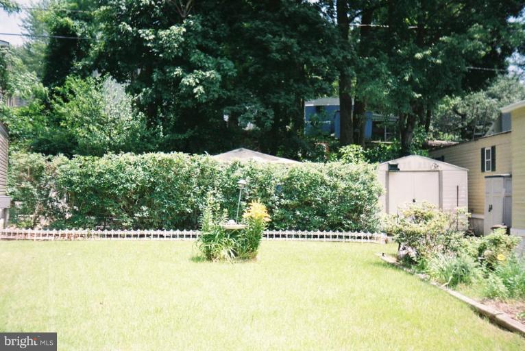 7810 Clark Road, Unit C 25 Jessup, MD 20794 - Photo 2 of 30 Large side yard with shed