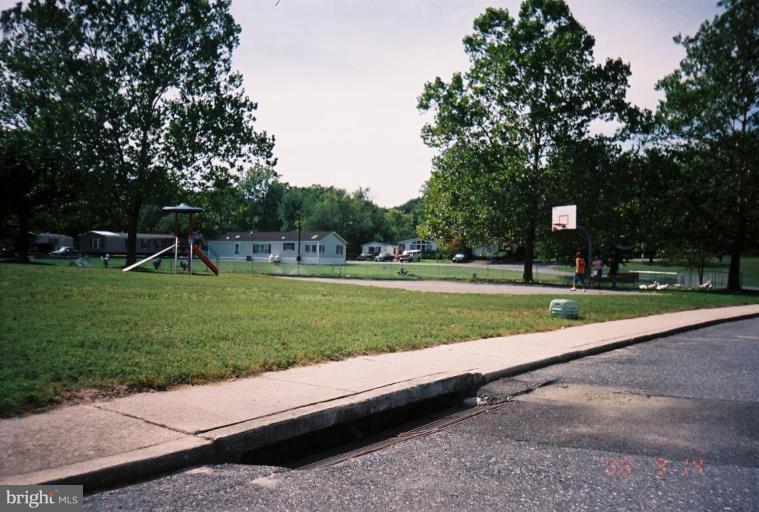 7810 Clark Road, Unit C 25 Jessup, MD 20794 - Photo 27 of 30 Basket ball court and playground