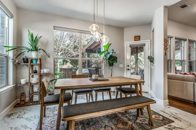 a kitchen with granite countertop a sink and a stove