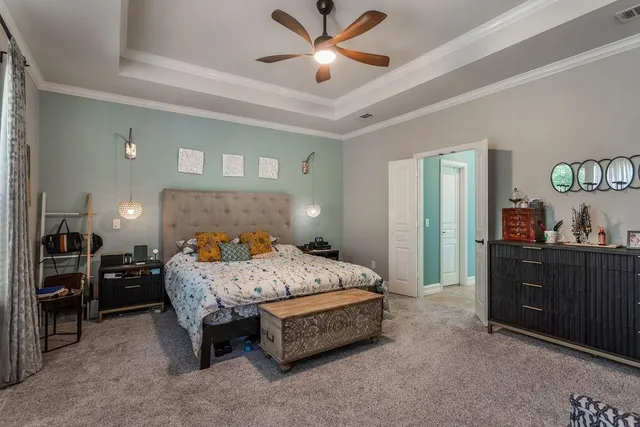 a en suite bathroom with a sink and a mirror