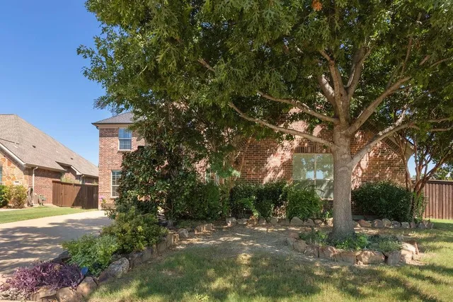 a view of a street with a building in the background