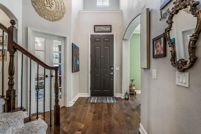 a view of front door with stairs