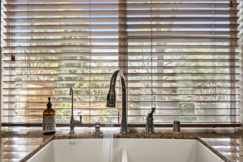 a close view of sink and a window