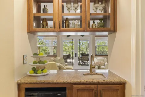 a kitchen with granite countertop kitchen island