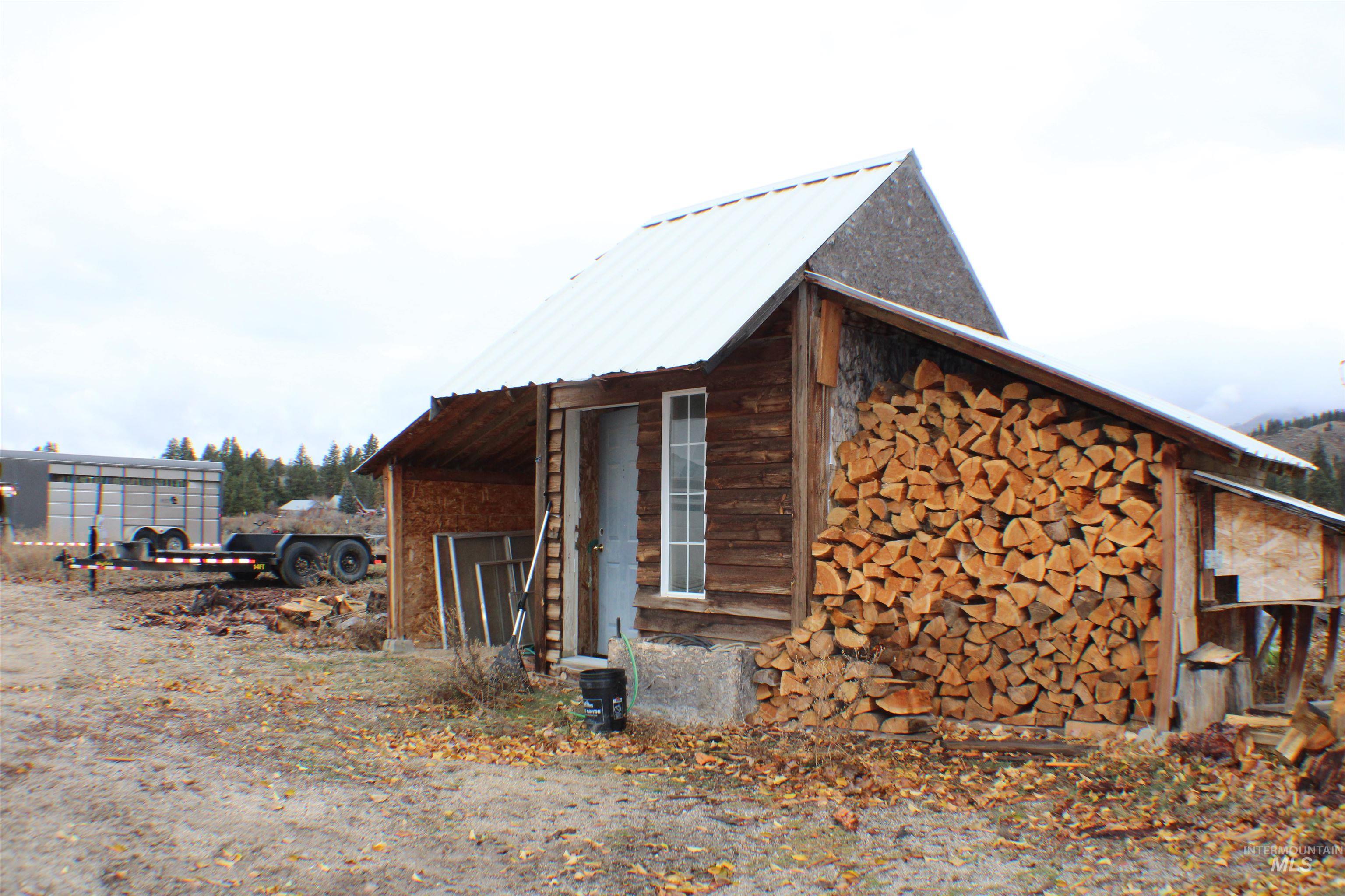 200 East Prairie Road Mountain Home, ID 83647 - Photo 26 of 38 View of side of property with a metal roof