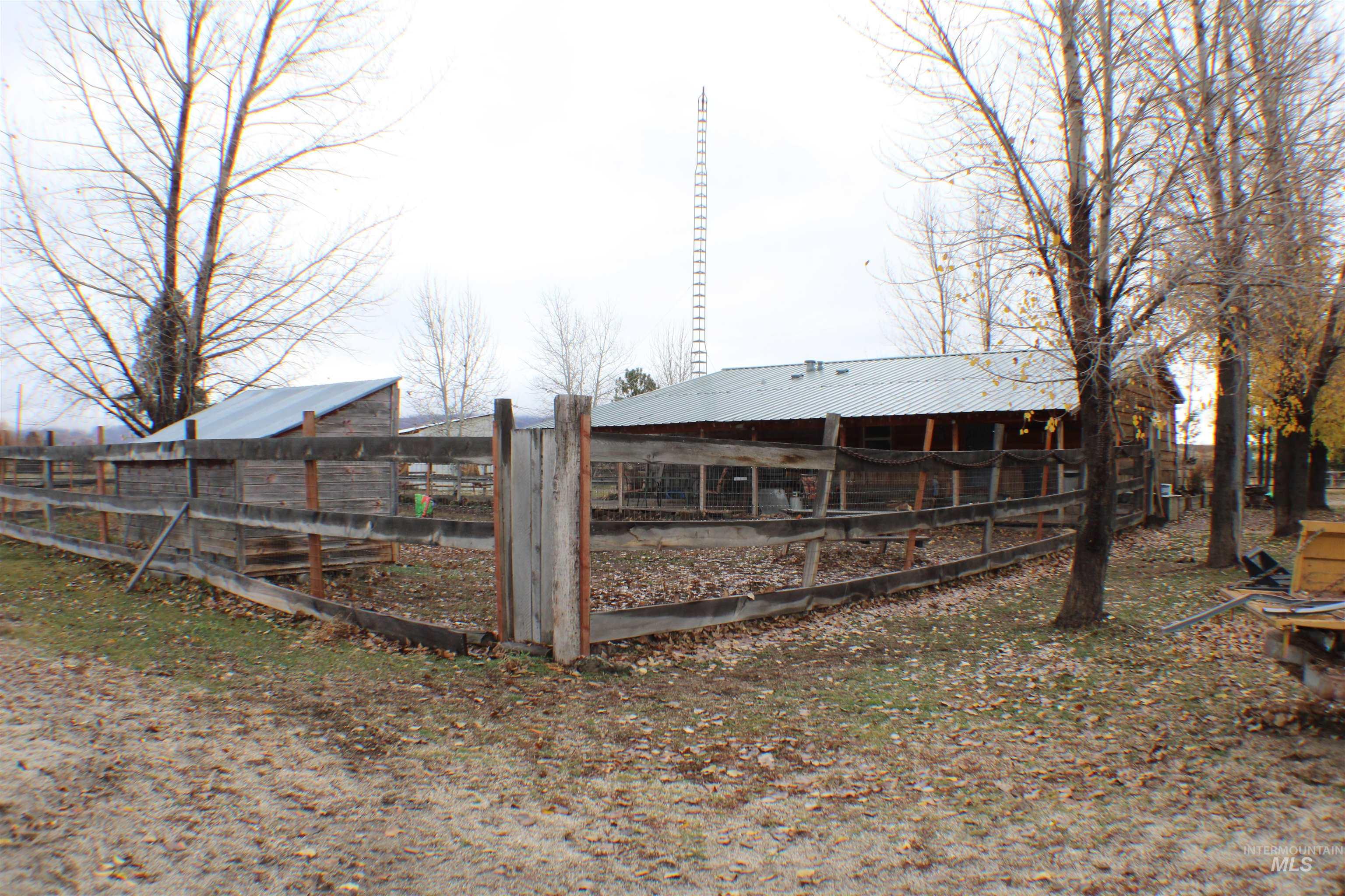 200 East Prairie Road Mountain Home, ID 83647 - Photo 27 of 38 Back of house featuring a metal roof