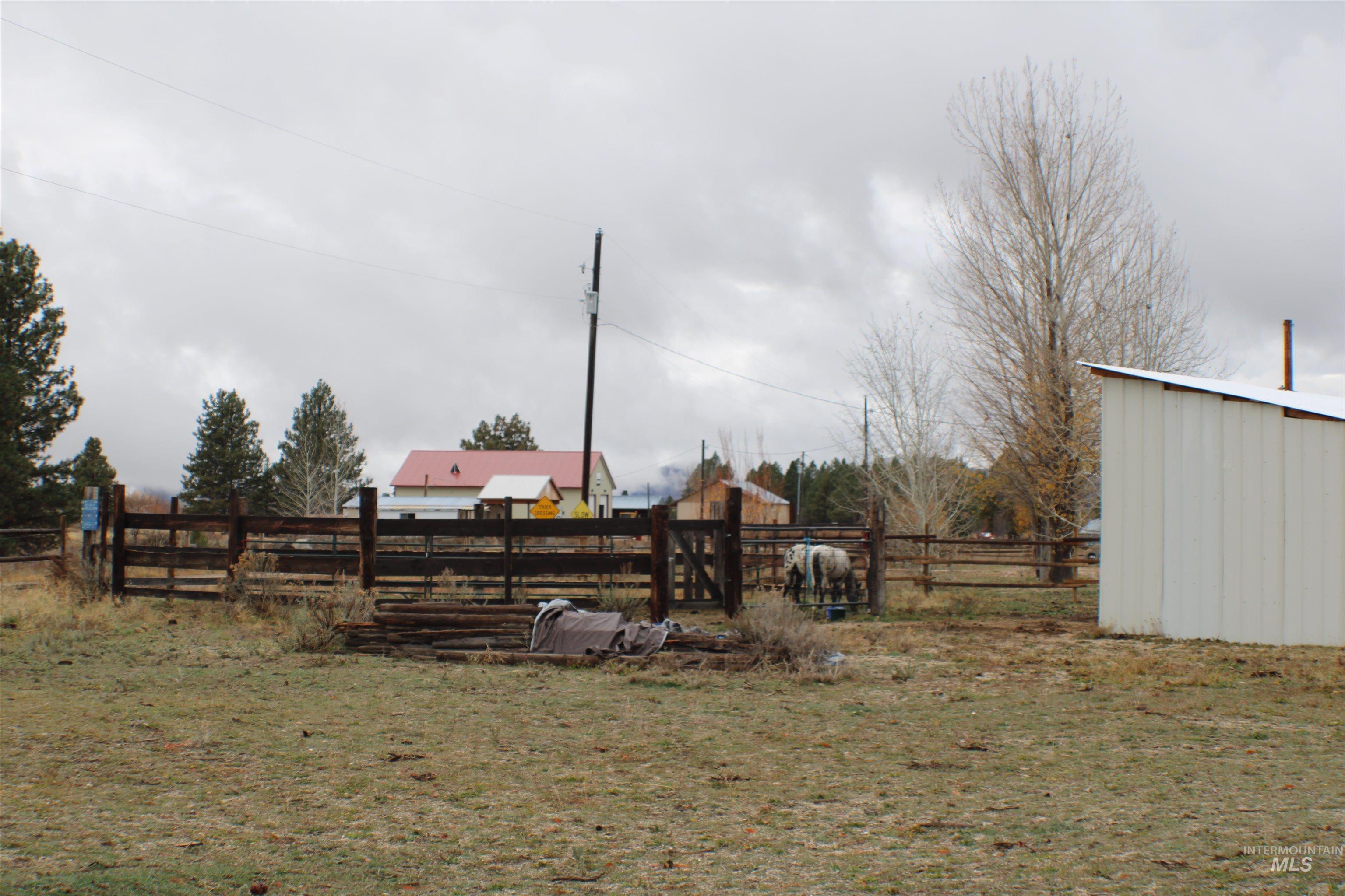200 East Prairie Road Mountain Home, ID 83647 - Photo 6 of 38 View of yard with an outdoor structure and a rural view