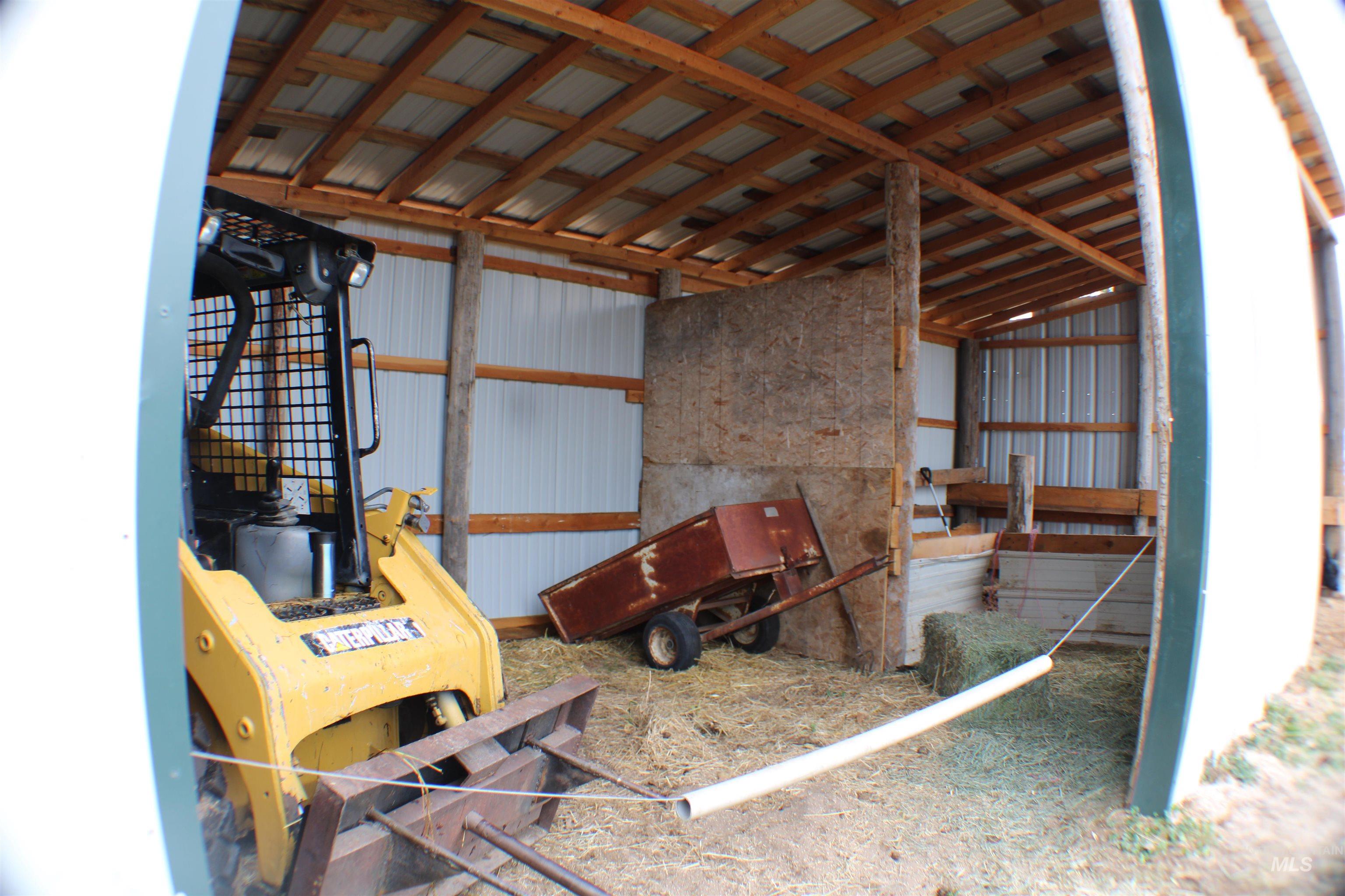 200 East Prairie Road Mountain Home, ID 83647 - Photo 8 of 38 Miscellaneous room with metal wall and lofted ceiling