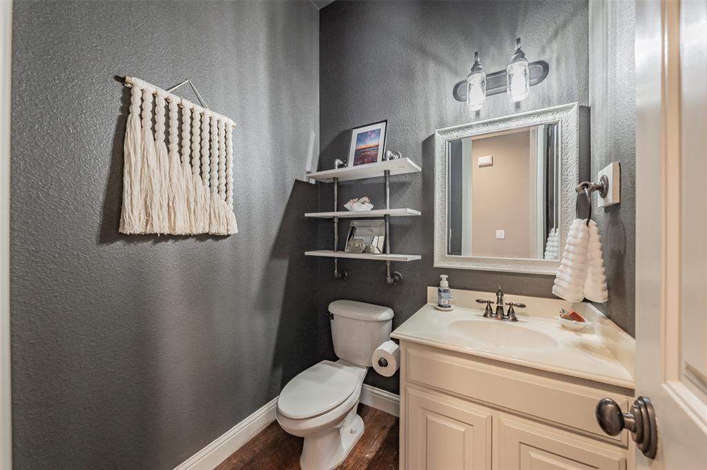 209 Thistle Ridge Denton, TX 76210 - Photo 23 of 40 Downstairs half bath
