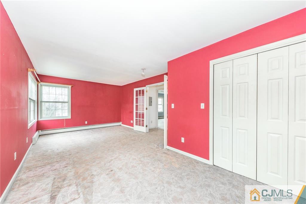 26 Moquis Trail Oak Ridge, NJ 07438 - Photo 19 of 23 an empty room with windows