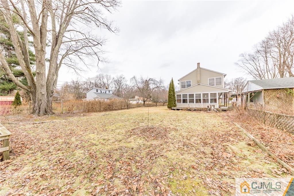 26 Moquis Trail Oak Ridge, NJ 07438 - Photo 23 of 23 a view of large trees with yard of the house