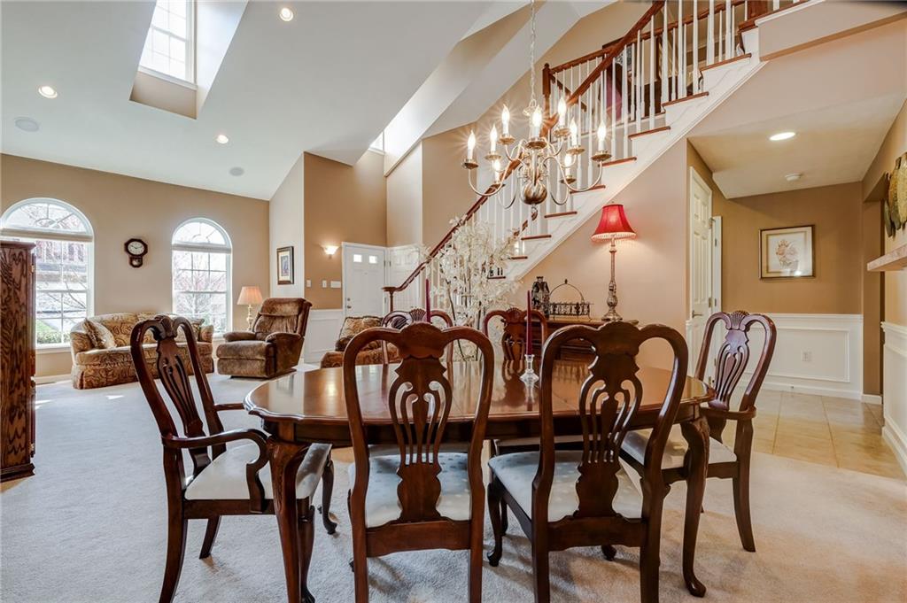 Extra Tall Ceilings and Skylights brighten this open layout.