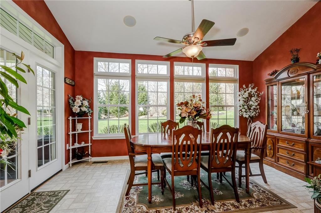 Sunroom Addition has surround Sound Speakers and makes the perfect Dining Room
