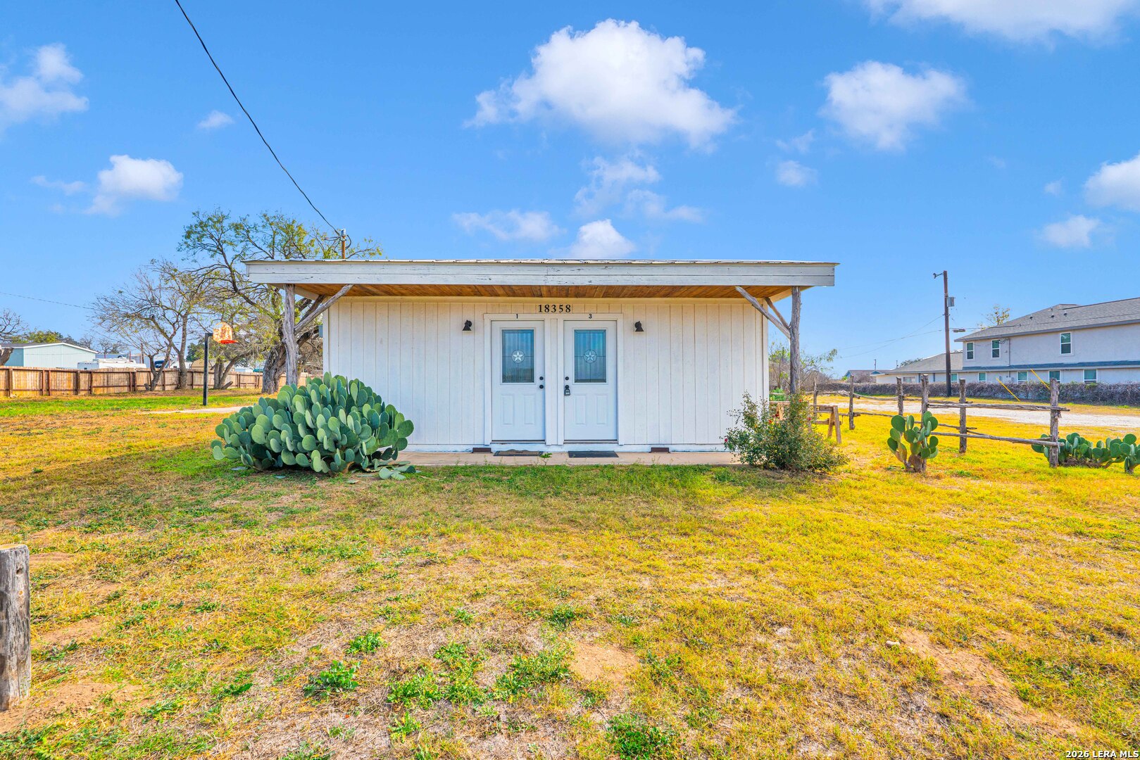 18460 Interstate 37 Elmendorf, TX 78112 - Photo 16 of 28 a view of a house with swimming pool