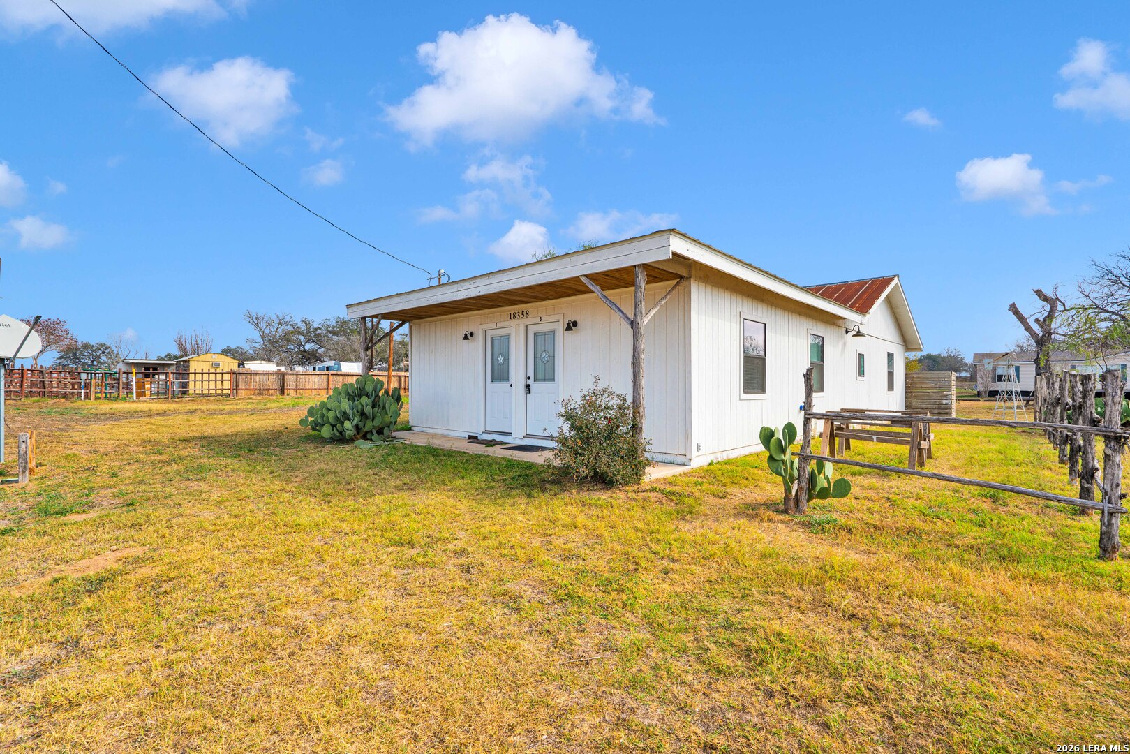 18460 Interstate 37 Elmendorf, TX 78112 - Photo 17 of 28 a view of a house with swimming pool