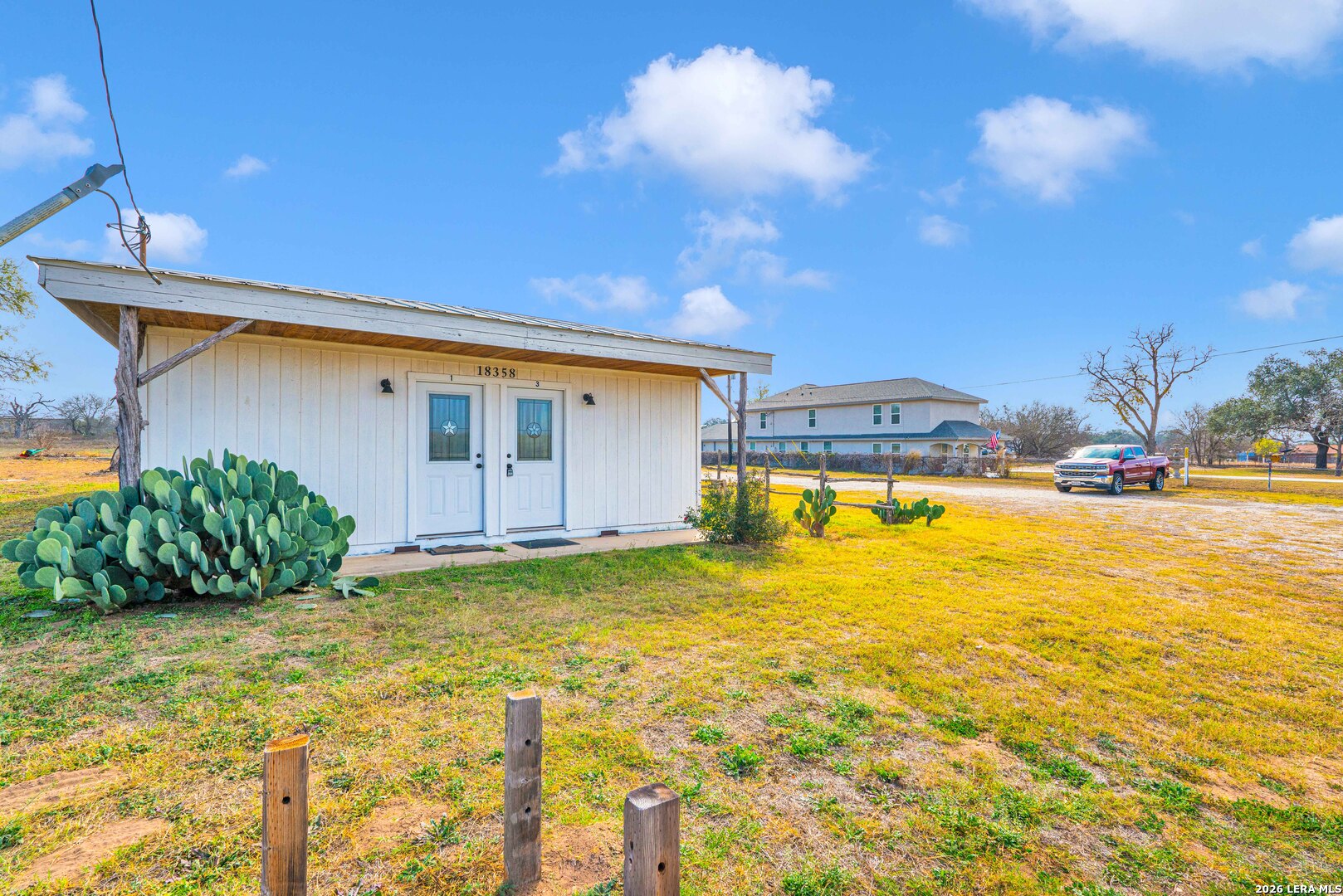 18460 Interstate 37 Elmendorf, TX 78112 - Photo 18 of 28 a view of swimming pool with an outdoor space and seating area