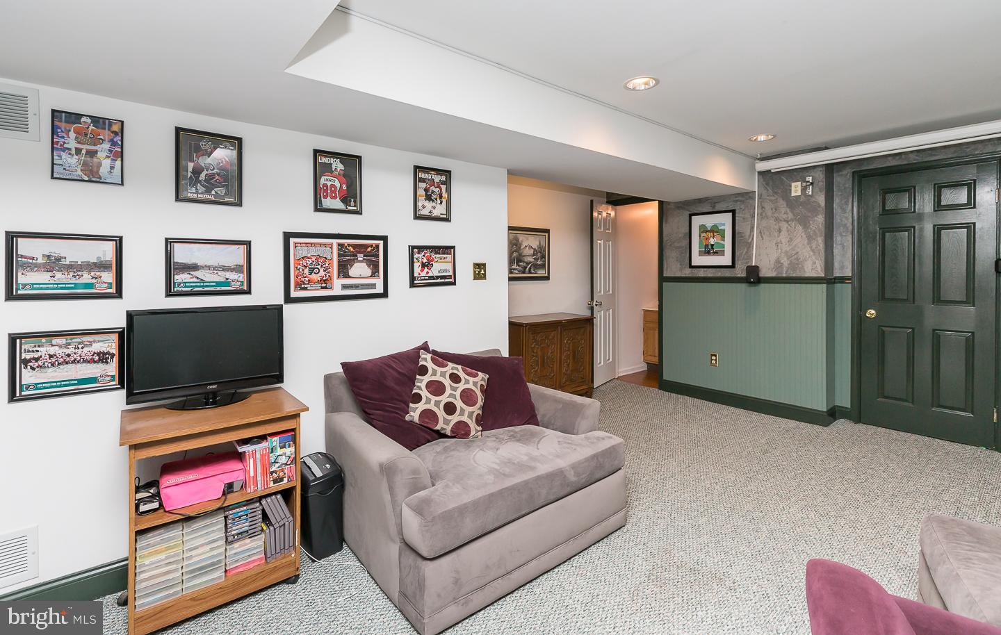 1943 Oak Leaf Lane Holmes, PA 19043 - Photo 31 of 38 doors lead to unfinished utility area/storage