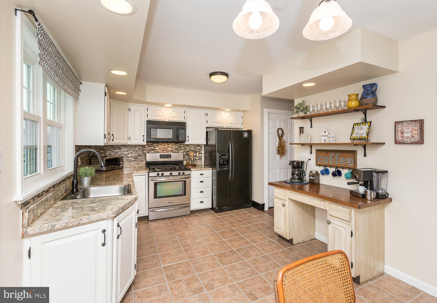 1943 Oak Leaf Lane Holmes, PA 19043 - Photo 9 of 38 modern kitchen with coffee bar