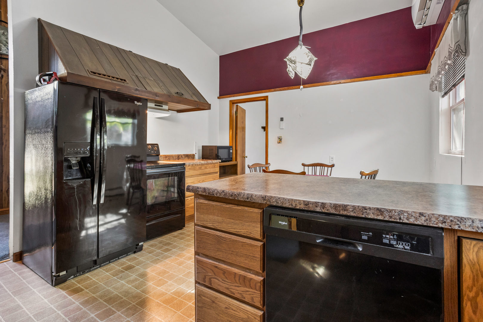 808 South Longview Road Monticello, IL 61856 - Photo 20 of 41 a kitchen with stainless steel appliances granite countertop a sink a stove and a refrigerator