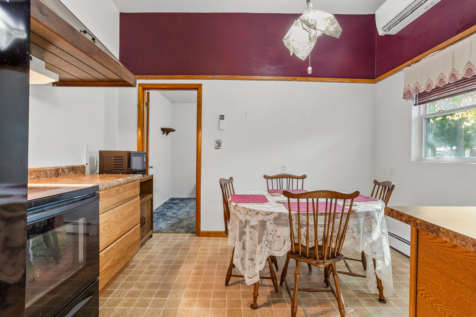808 South Longview Road Monticello, IL 61856 - Photo 22 of 41 a kitchen that has a table and chairs in it