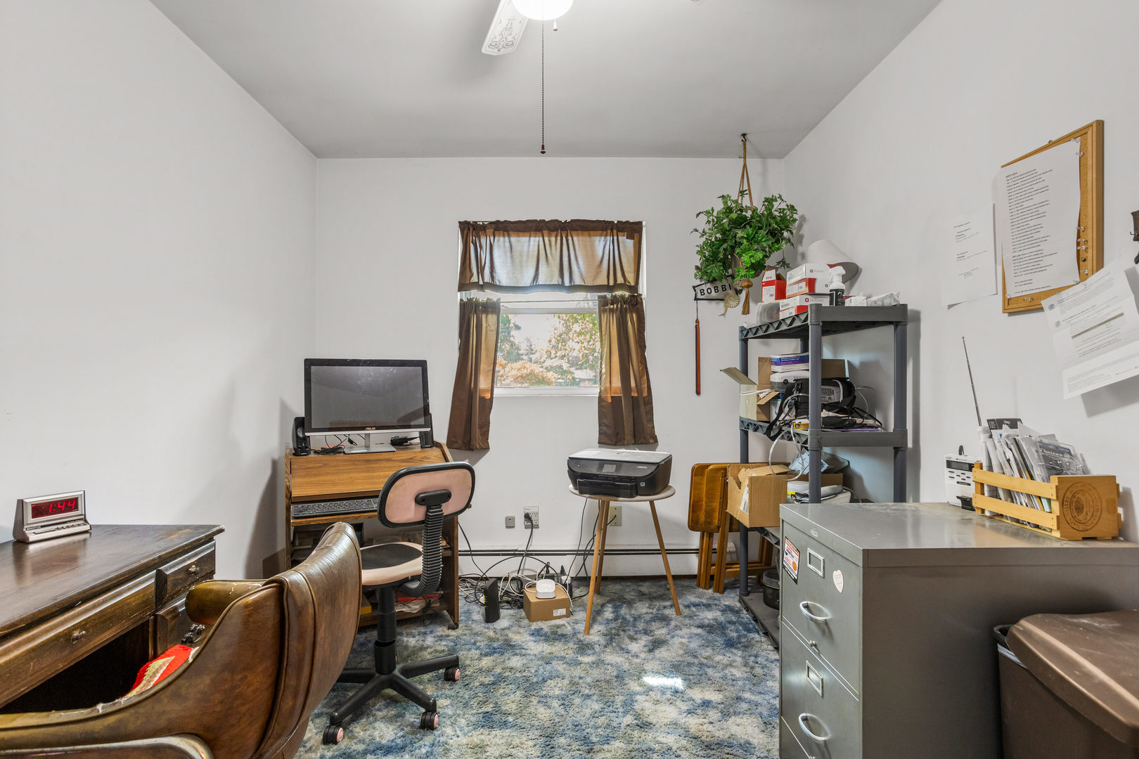 808 South Longview Road Monticello, IL 61856 - Photo 25 of 41 a view of a workspace with furniture and a livingroom