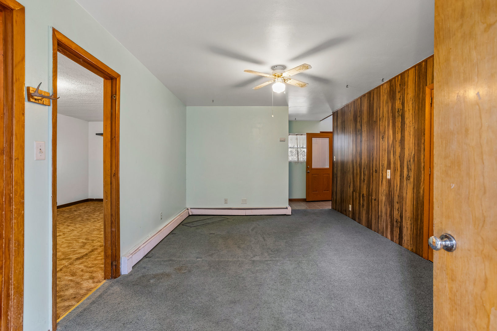 808 South Longview Road Monticello, IL 61856 - Photo 10 of 41 an empty room with closet and a chandelier fan