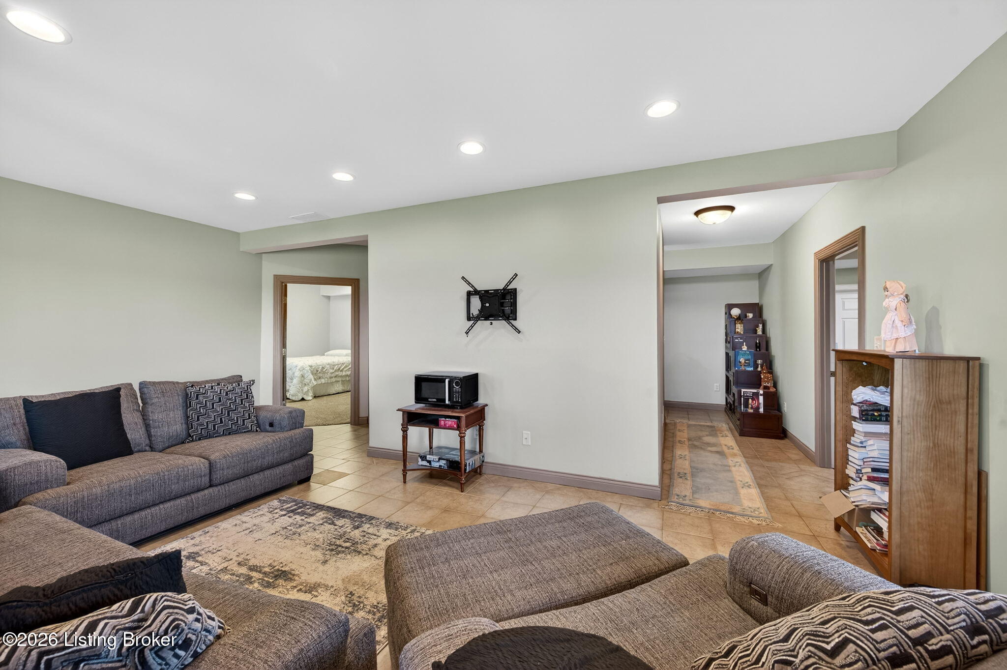 771 Mud Splash Road Elizabethtown, KY 42701 - Photo 61 of 85 Recessed lighting and a smooth finish ceiling give the family room a clean, well-finished look