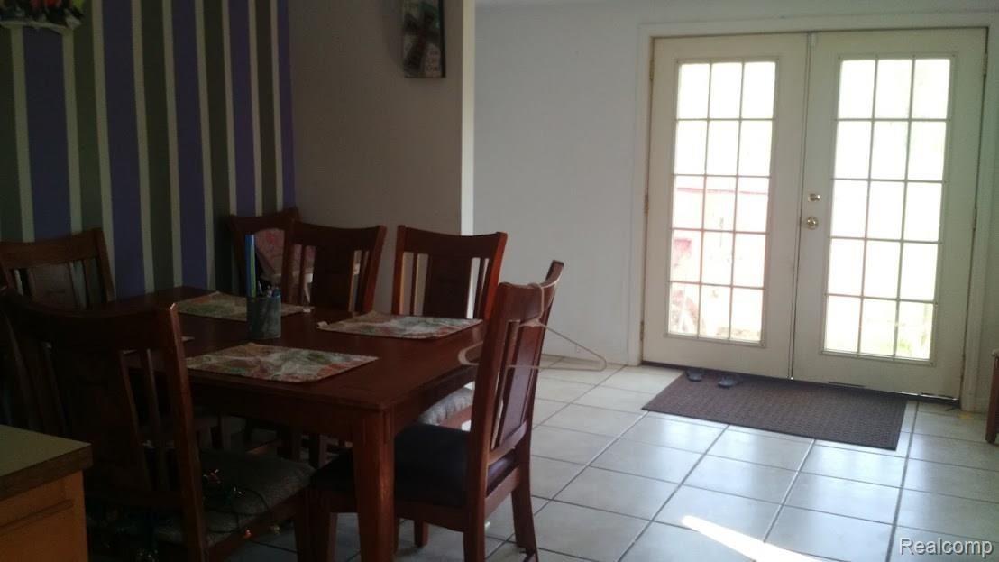 12664 Ostrander Road Maybee, MI 48159 - Photo 10 of 12 Ost Dining to doorwall.jpg
