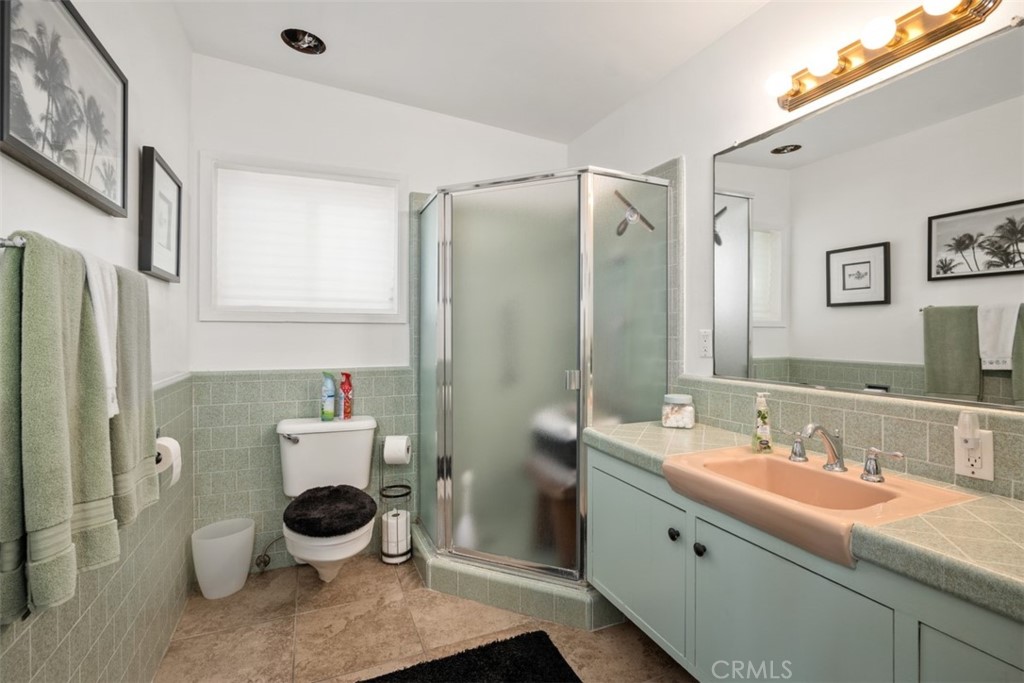 35725 Beach Road Dana Point, CA 92624 - Photo 23 of 40 a bathroom with a sink toilet and shower