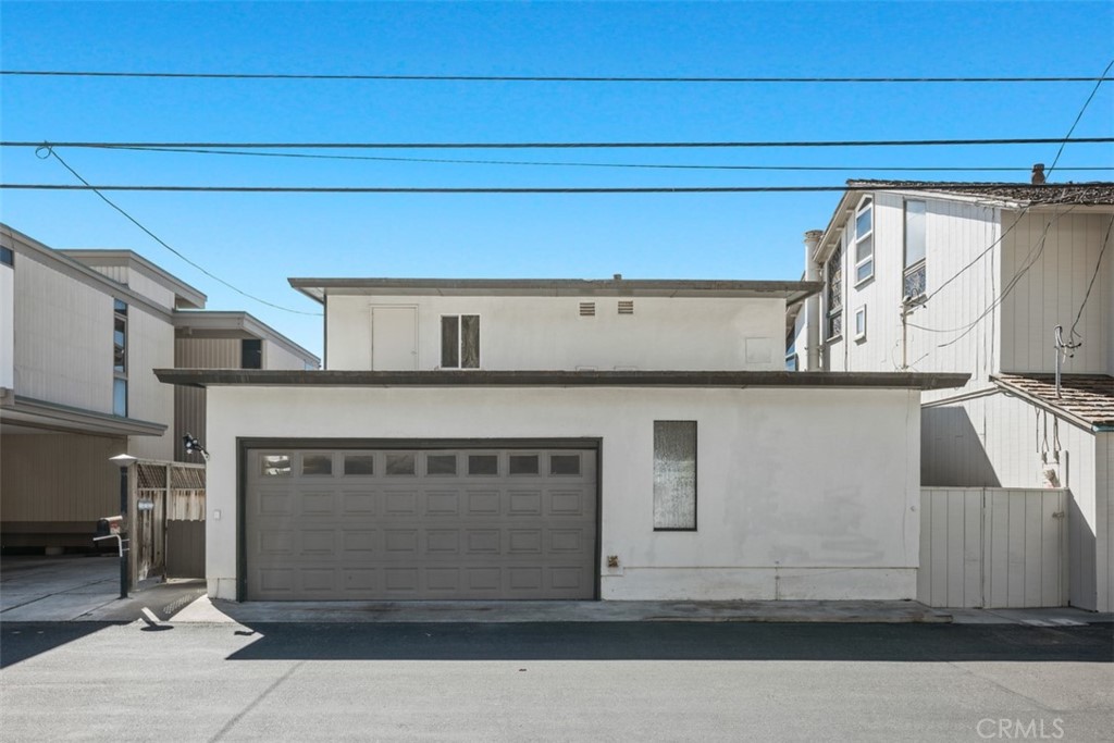35725 Beach Road Dana Point, CA 92624 - Photo 31 of 40 a front view of a house with a garage