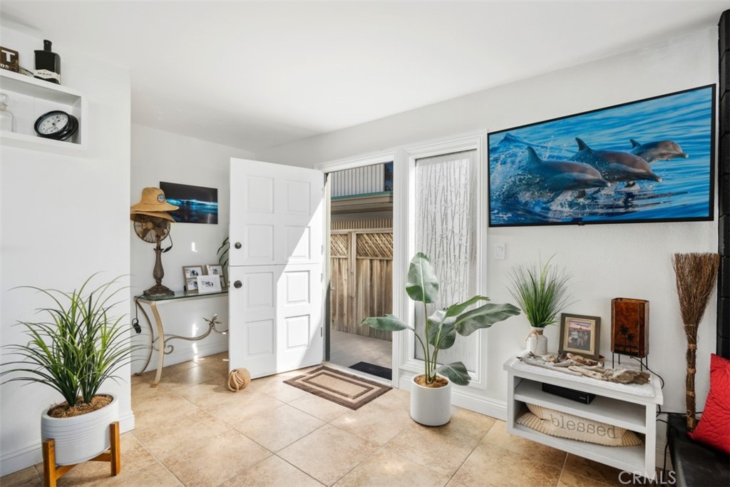 35725 Beach Road Dana Point, CA 92624 - Photo 7 of 40 a view of a workspace with furniture and a potted plant